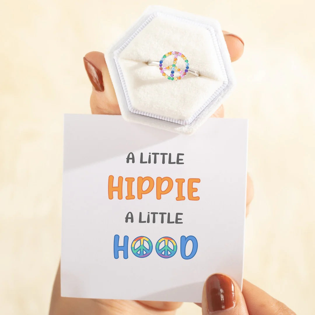 A LITTLE HIPPIE -DIAMOND PEACE SYMBOL RING