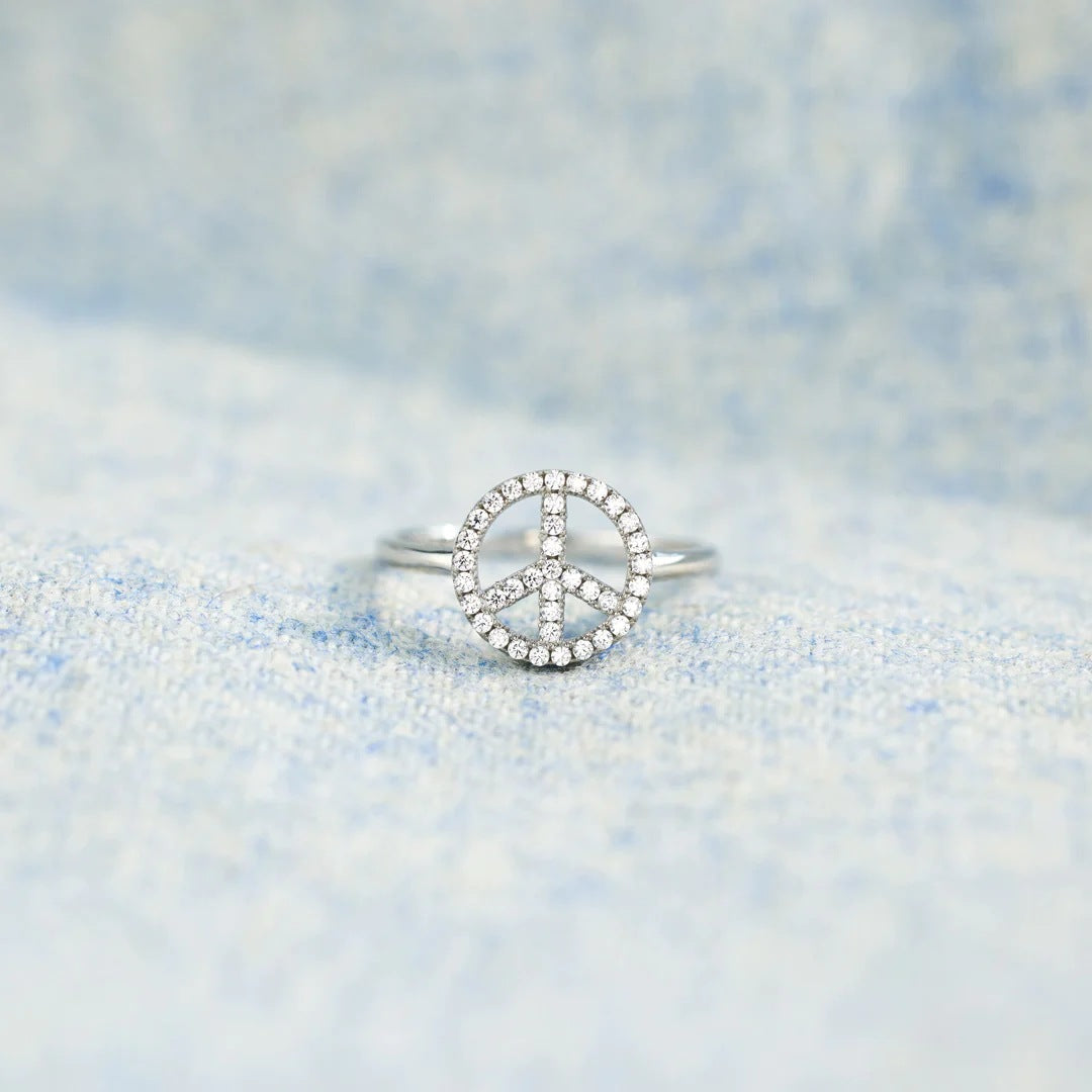 A LITTLE HIPPIE -DIAMOND PEACE SYMBOL RING